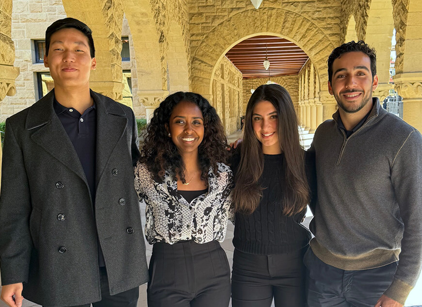 A group of four students represents a senior project team